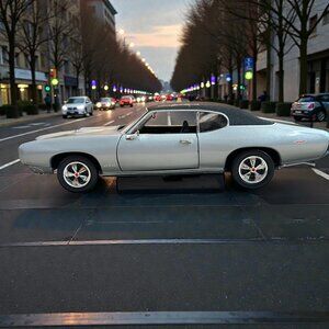 Ertl 1969 Pontiac "Arnie the Farmer" Beswick Diecast Model Silver with Black Top